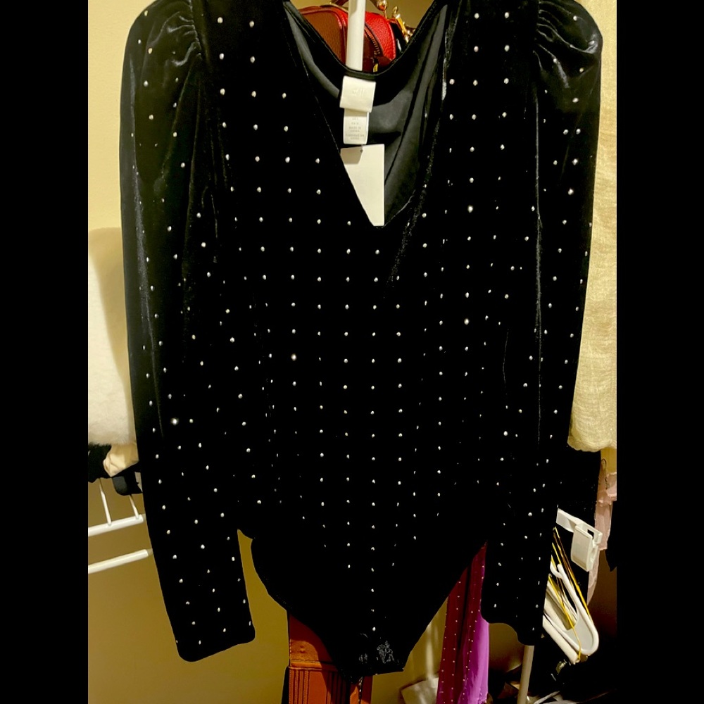 Stunning ladies body suit top, black velvet type material with chrome studs.